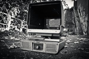 Picture of an old computer in a graveyard looking cave